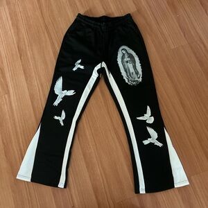 Virgin mary flared sweatpants
Nen and woman